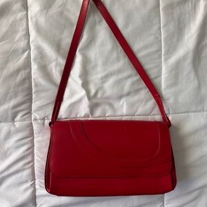 Vintage red leather shoulder bag with pink cheetah interior lining